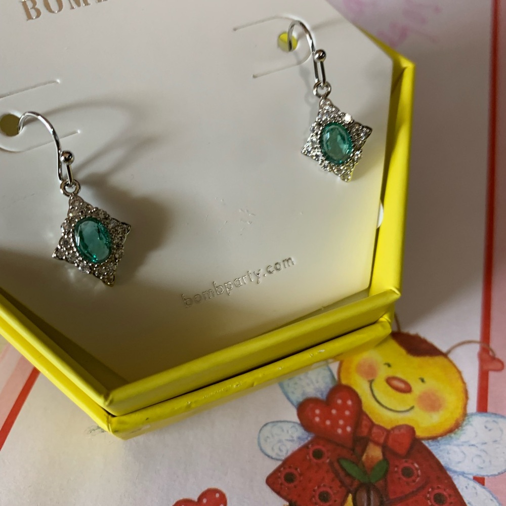 Brand new bomb party earrings never worn